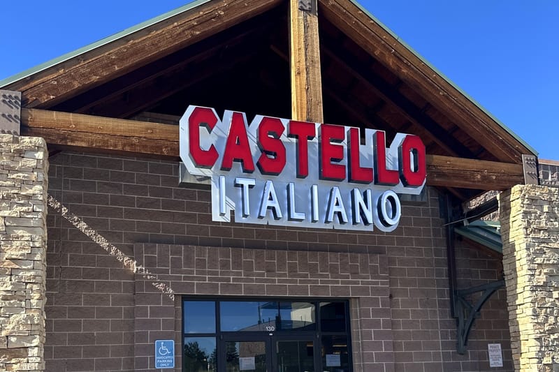 The Castello Italiano sign above the entrance at 361 Village Square Ln in Castle Pines