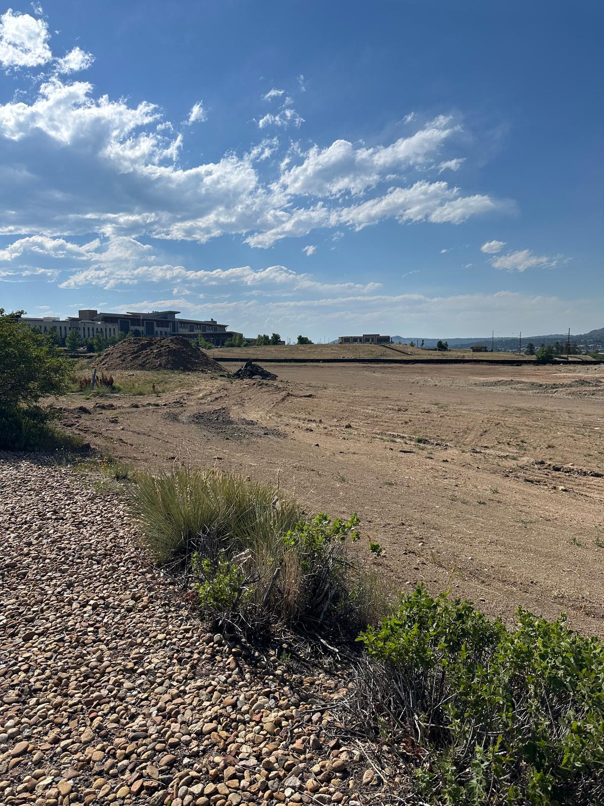 The cleared construction site for the future Chicken Salad Chick in Castle Rock's Meadows neighborhood, June 2026