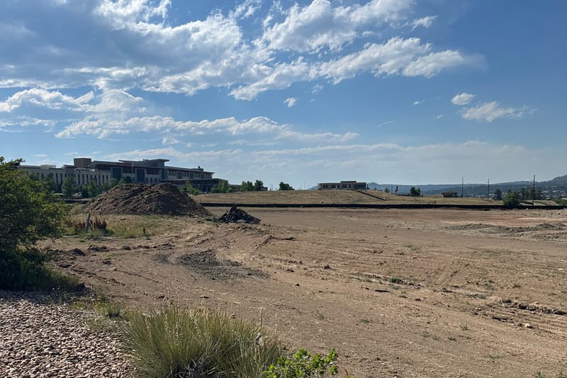 The cleared construction site for the future Chicken Salad Chick in Castle Rock's Meadows neighborhood, June 2026