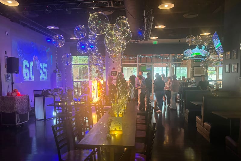 The bar at Clock Tower Grill in Lone Tree, lit up for a party