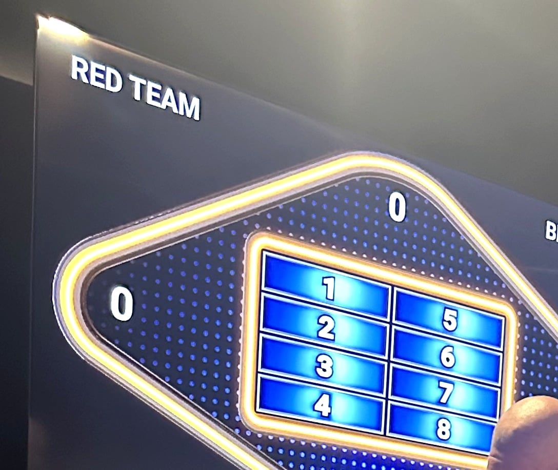 The Friendly Feud answer board with Red Team and Blue Team at 0-0