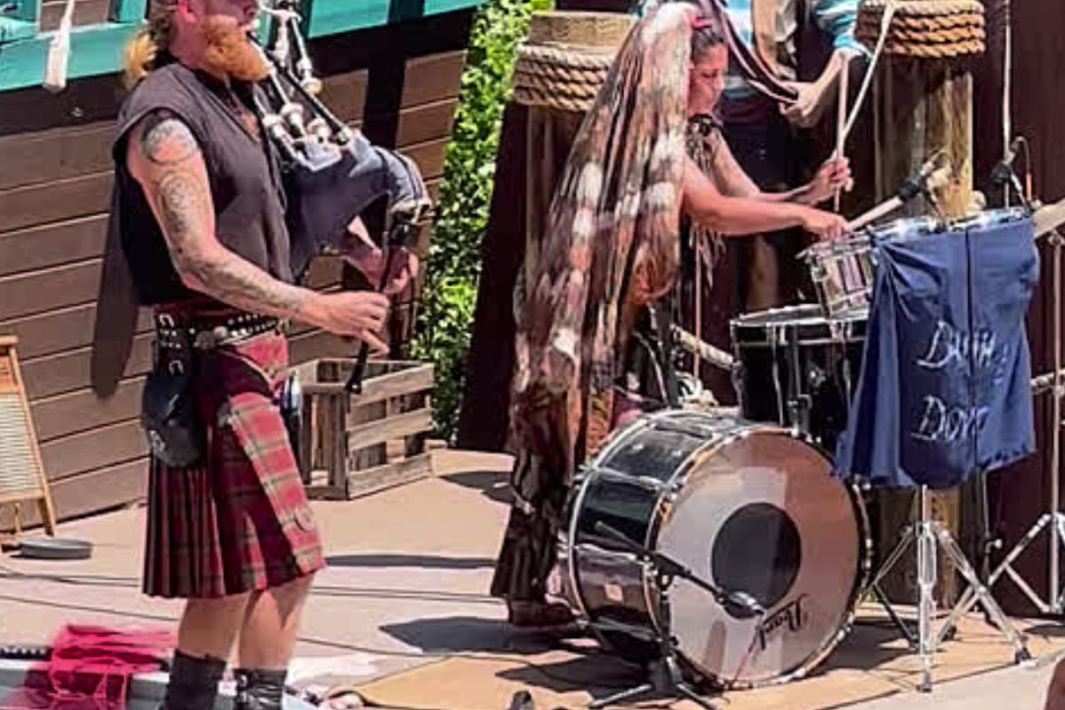 Bagpipe and drum street performers at the Colorado Renaissance Festival