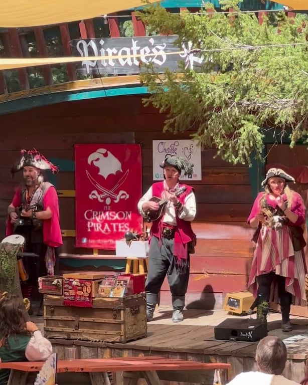 The Crimson Pirates, a costumed pirate band, performing at the Colorado Renaissance Festival