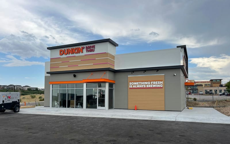 The Dunkin' Drive Thru building at 1185 Aloha Street in Castle Rock before opening, with signage installed
