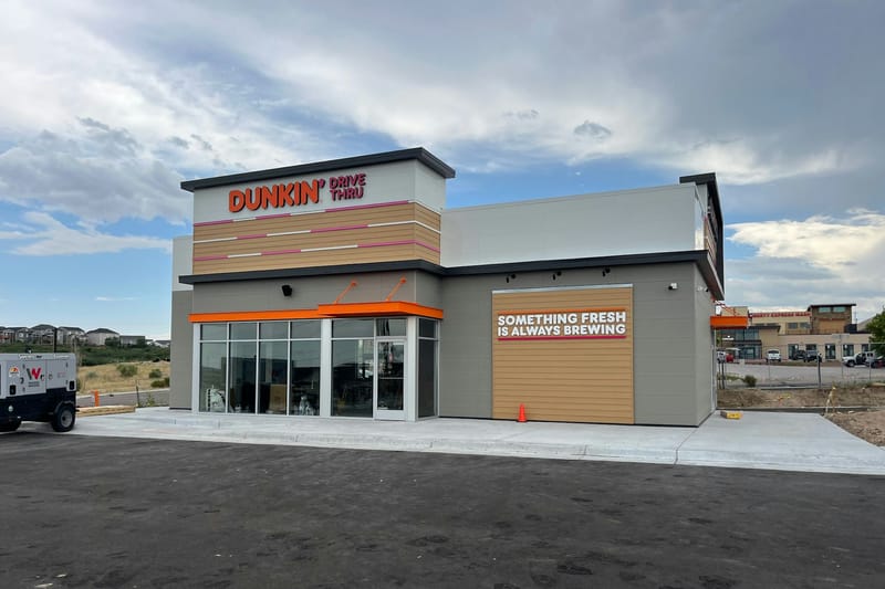 The Dunkin' Drive Thru building at 1185 Aloha Street in Castle Rock before opening, with signage installed