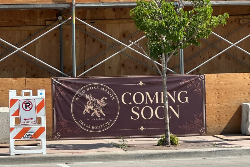 Wild Rose Manor boutique coming-soon banner at Parker's East Main development