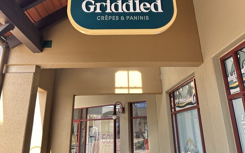 Griddled Crêpes & Paninis storefront sign at Outlets at Castle Rock, Suite 175