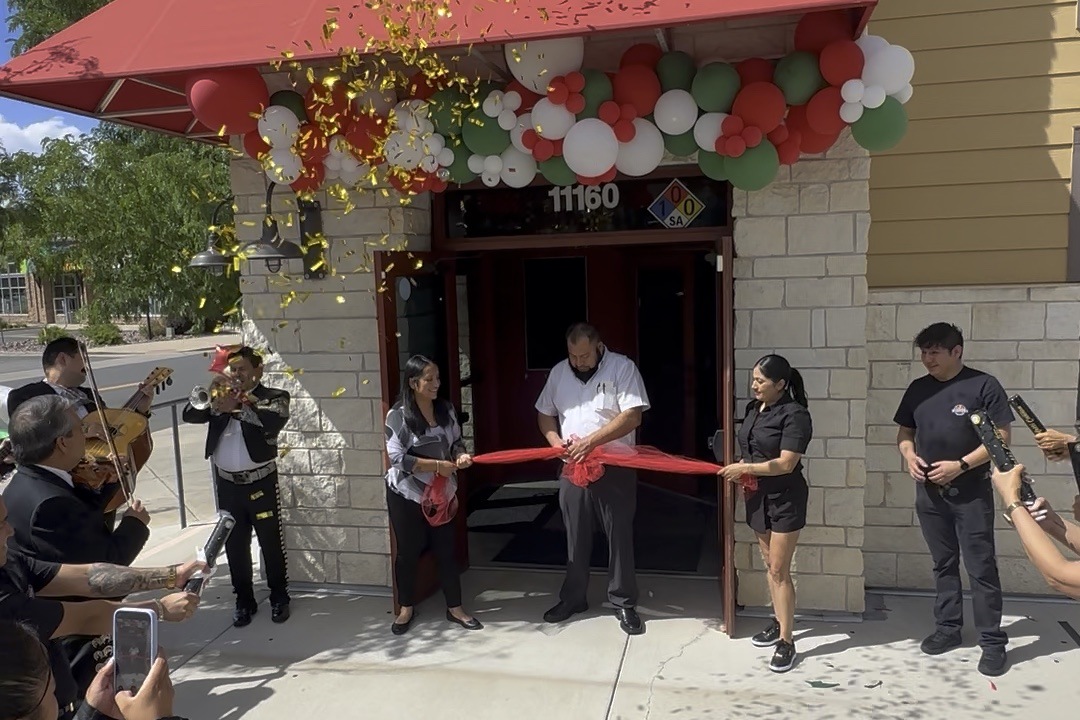 Owner Jose Poblano cuts the ribbon at JP Cocina & Cantina in Parker on August 19, 2026, with a mariachi band playing alongside