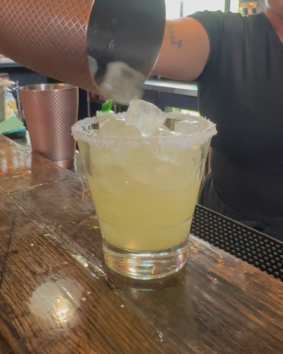 Margaritas, $11 to $13 on the house list and $18 on the Upscale one