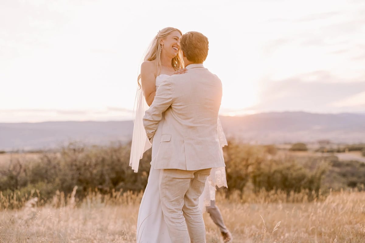 KB Ranch wedding setting with golden hour light over open Castle Rock pasture