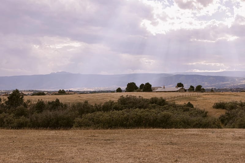 KB Ranch in Castle Rock with Front Range mountain views — open-air event venue and working farm