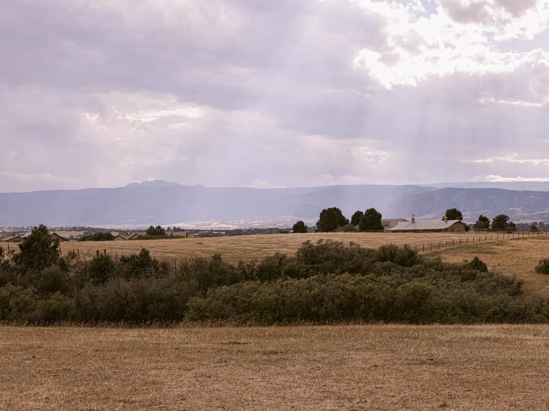 KB Ranch in Castle Rock with Front Range mountain views — open-air event venue and working farm