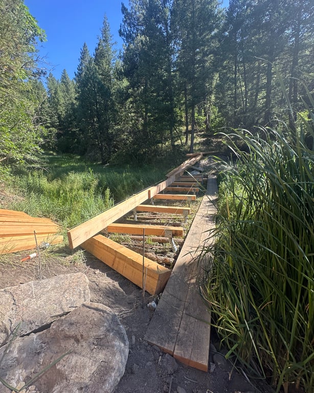 Fresh trail construction, cut lumber and rebar, at Lost Canyon Ranch Open Space during its phased opening, Castle Rock
