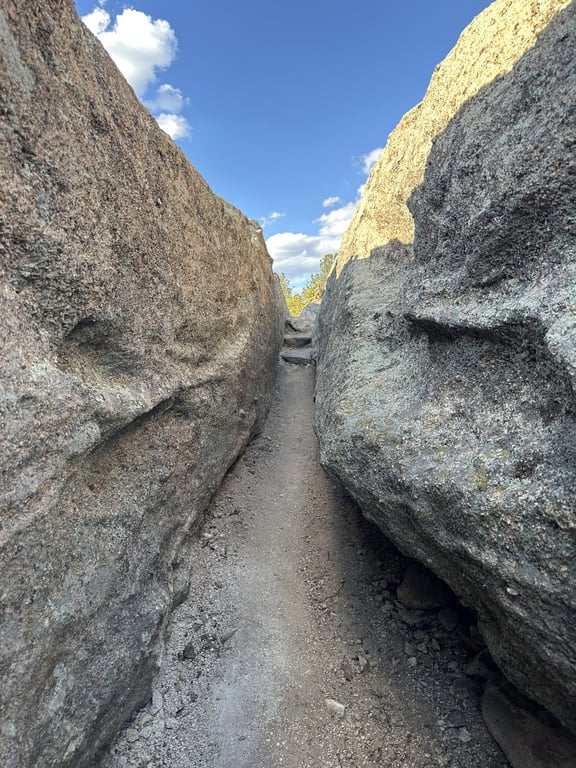 The narrow slot between two big boulders on Rustler's Ridge Loop at Lost Canyon Ranch Open Space, Castle Rock
