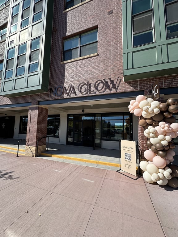 Balloon arch at Nova Glow Studio's grand opening in Parker, Colorado