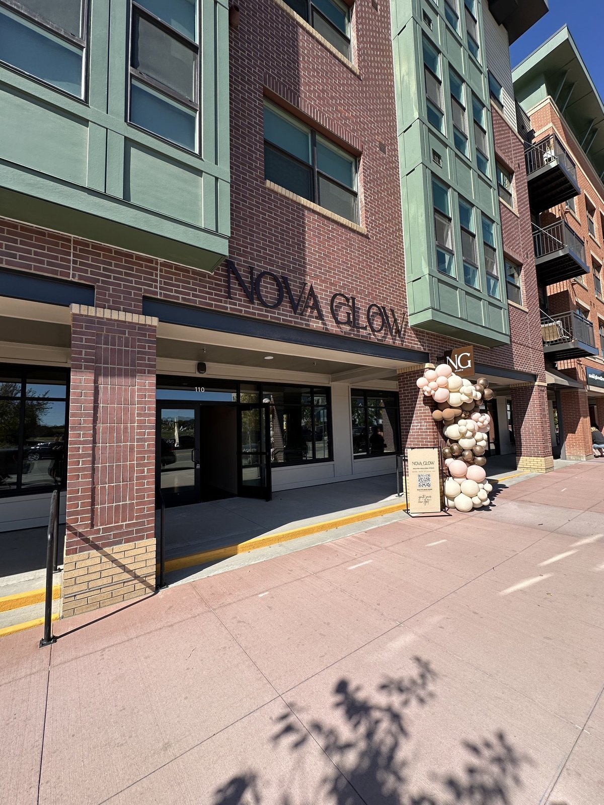 Nova Glow Studio storefront and sign at The Juniper on Mainstreet in Parker, Colorado