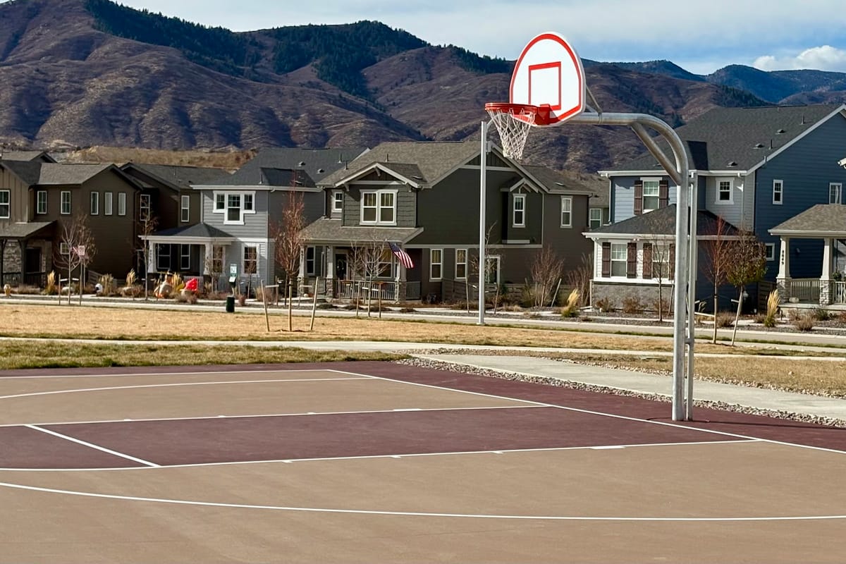 Open lawn and seating at Prospect Village Community Park