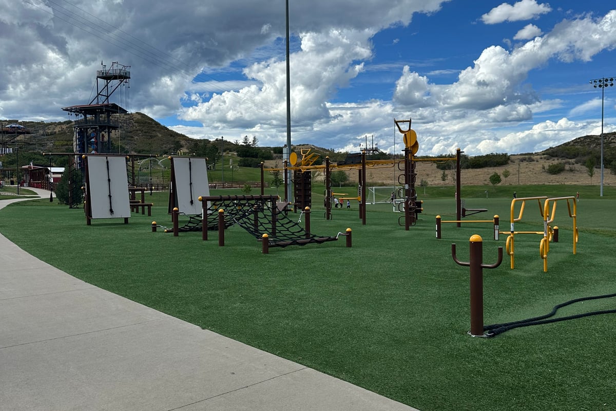 The outdoor FitGround equipment and the zip line tower at Philip S. Miller Park in Castle Rock