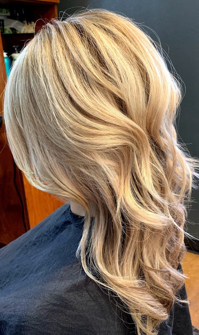 Hair by Julie B. In Sola Salon Studios atmosphere and seating
