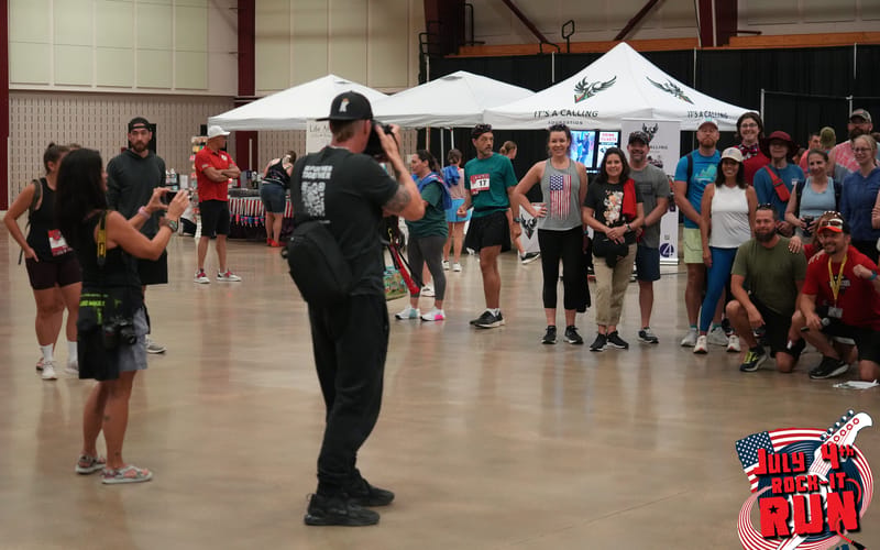 Crowd gathered inside the Douglas County Event Center expo hall at the 5th Annual July 4th ROCK-IT RUN in Castle Rock