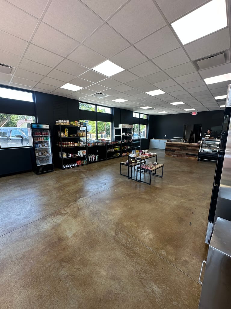 Rugby Scott storefront corner at Mainstreet and Pikes Peak Drive