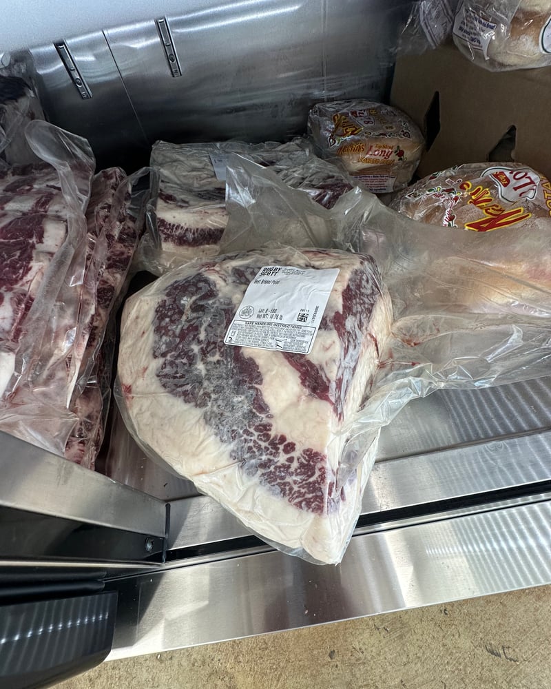 Marbled Wagyu beef cuts in the case at Rugby Scott in Parker