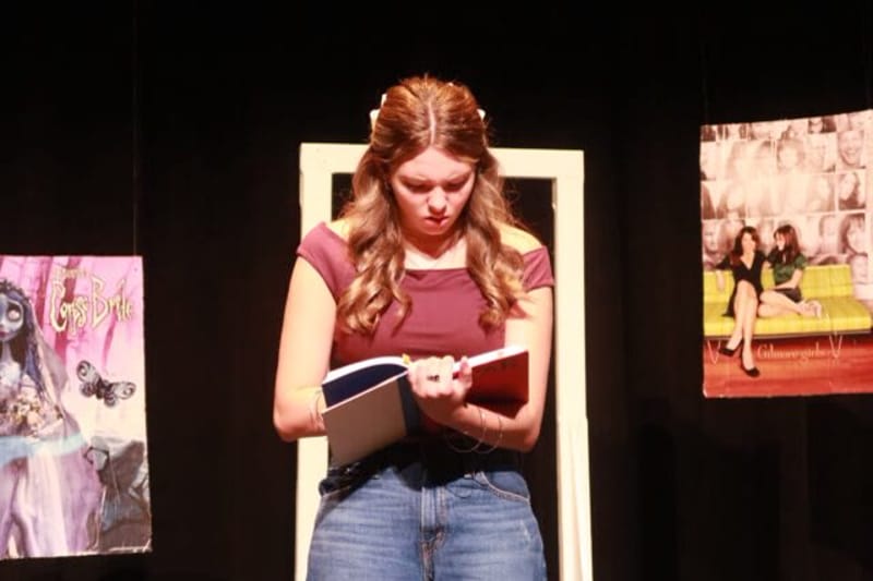 A performer on stage at Stage Flight Theatre