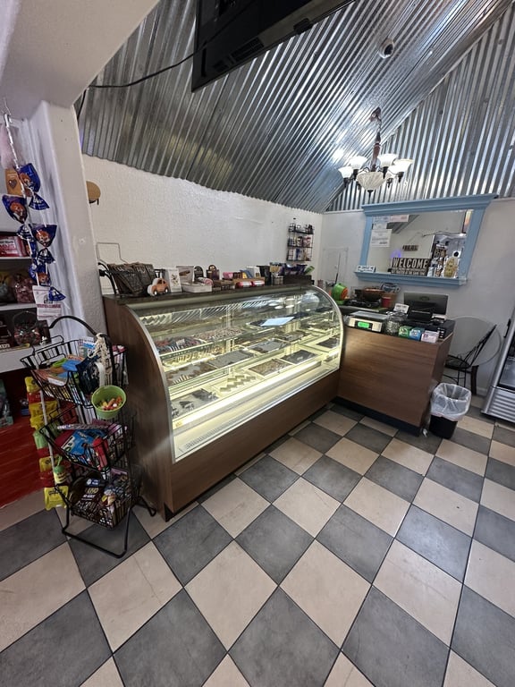 The fudge and hand-dipped chocolate case, unchanged under the new owners.