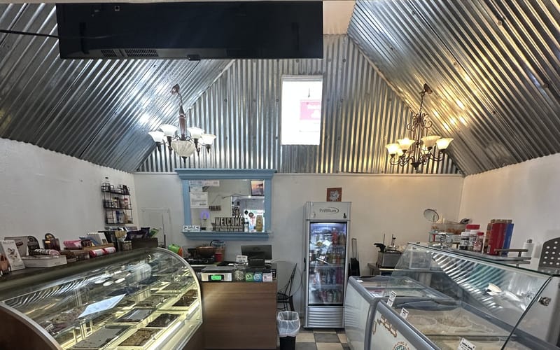 The ice cream case now sits opposite the chocolates — the change you notice first.