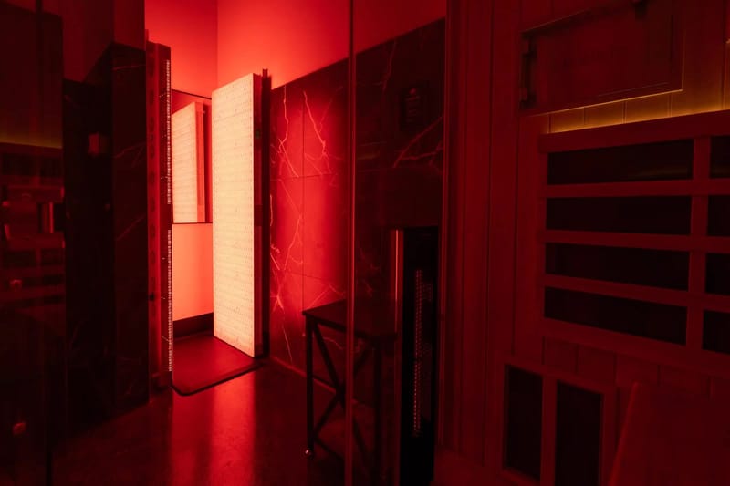 Red-lit infrared sauna rooms at Tesoro Life