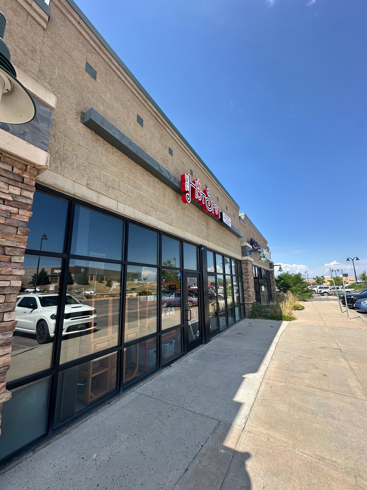 Storefront exterior of The Hot Spot Studios at 729 Barranca Drive in Castle Rock