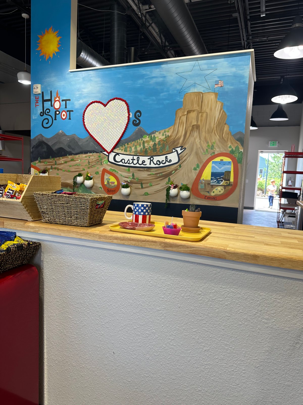 Hand-painted Castle Rock mural inside The Hot Spot Studios in Castle Rock