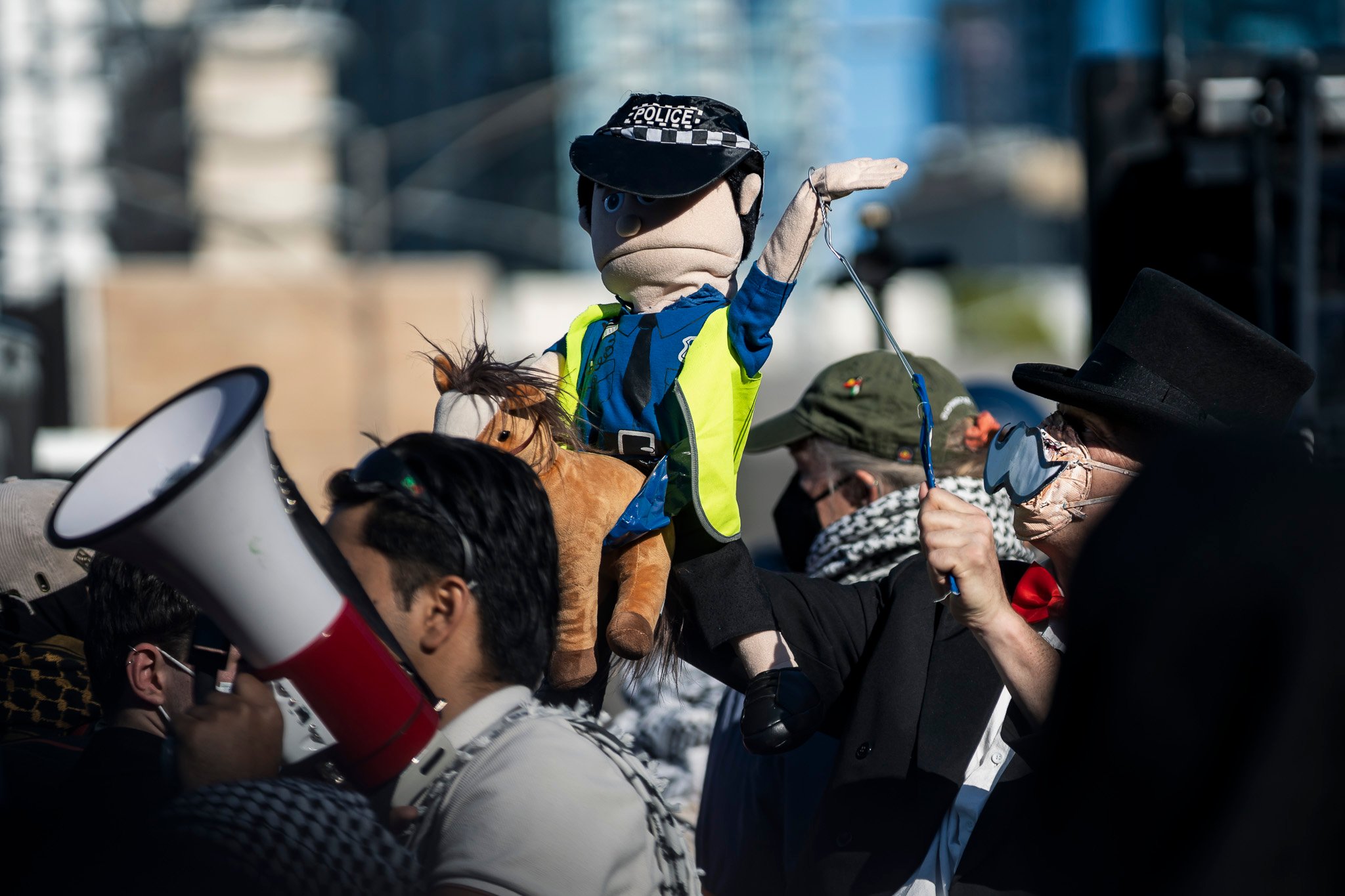 The march was met with dozens of Public Order Response Team (PORT) members in riot control gear.