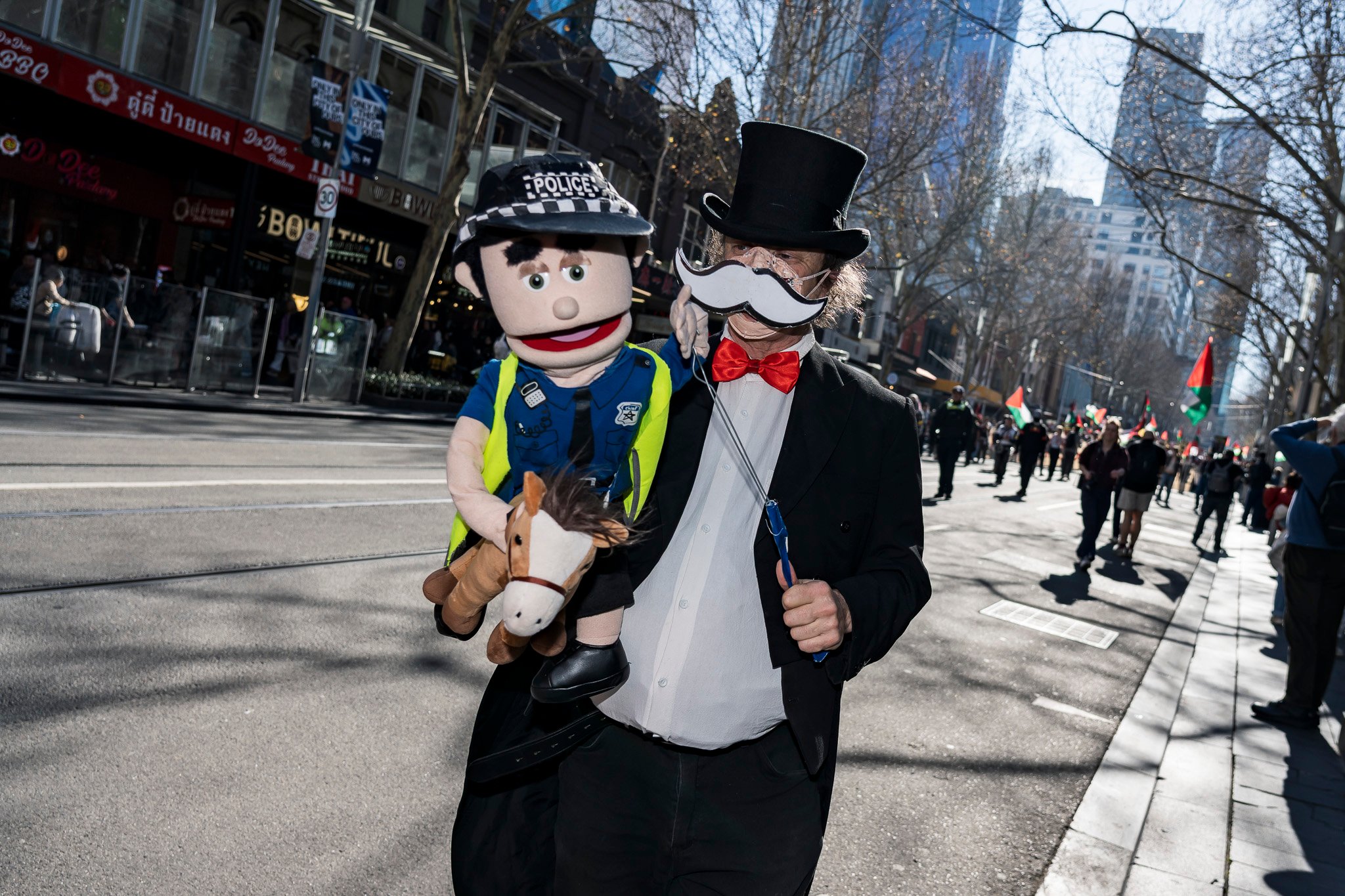 The march begins, moving down Swanston St.