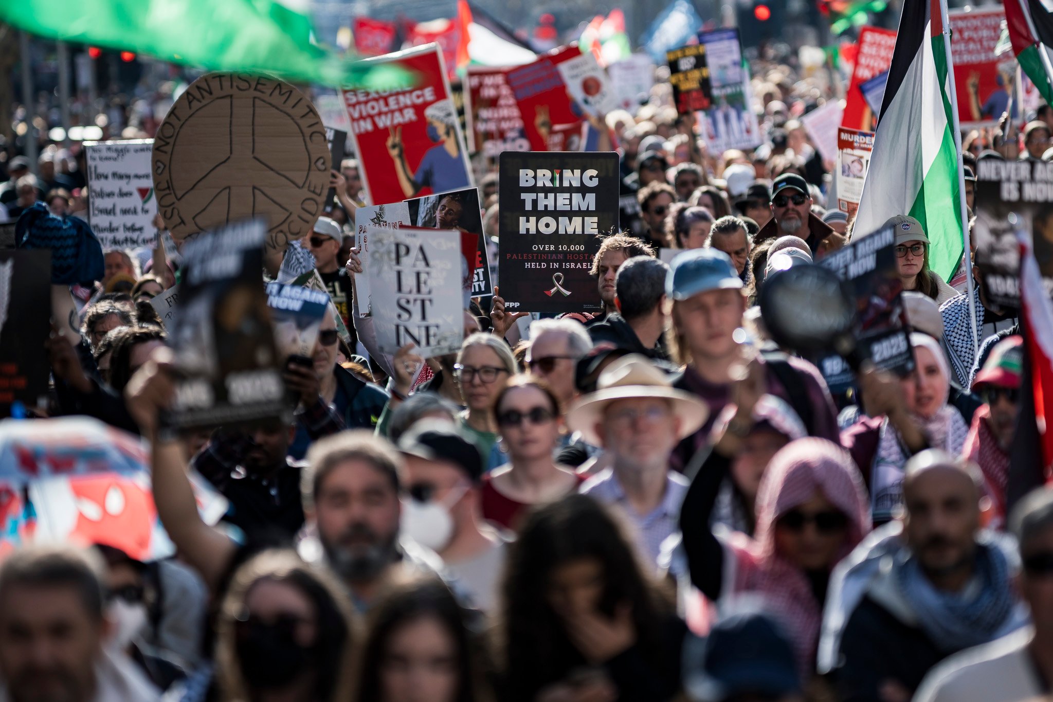 The march begins, moving down Swanston St.