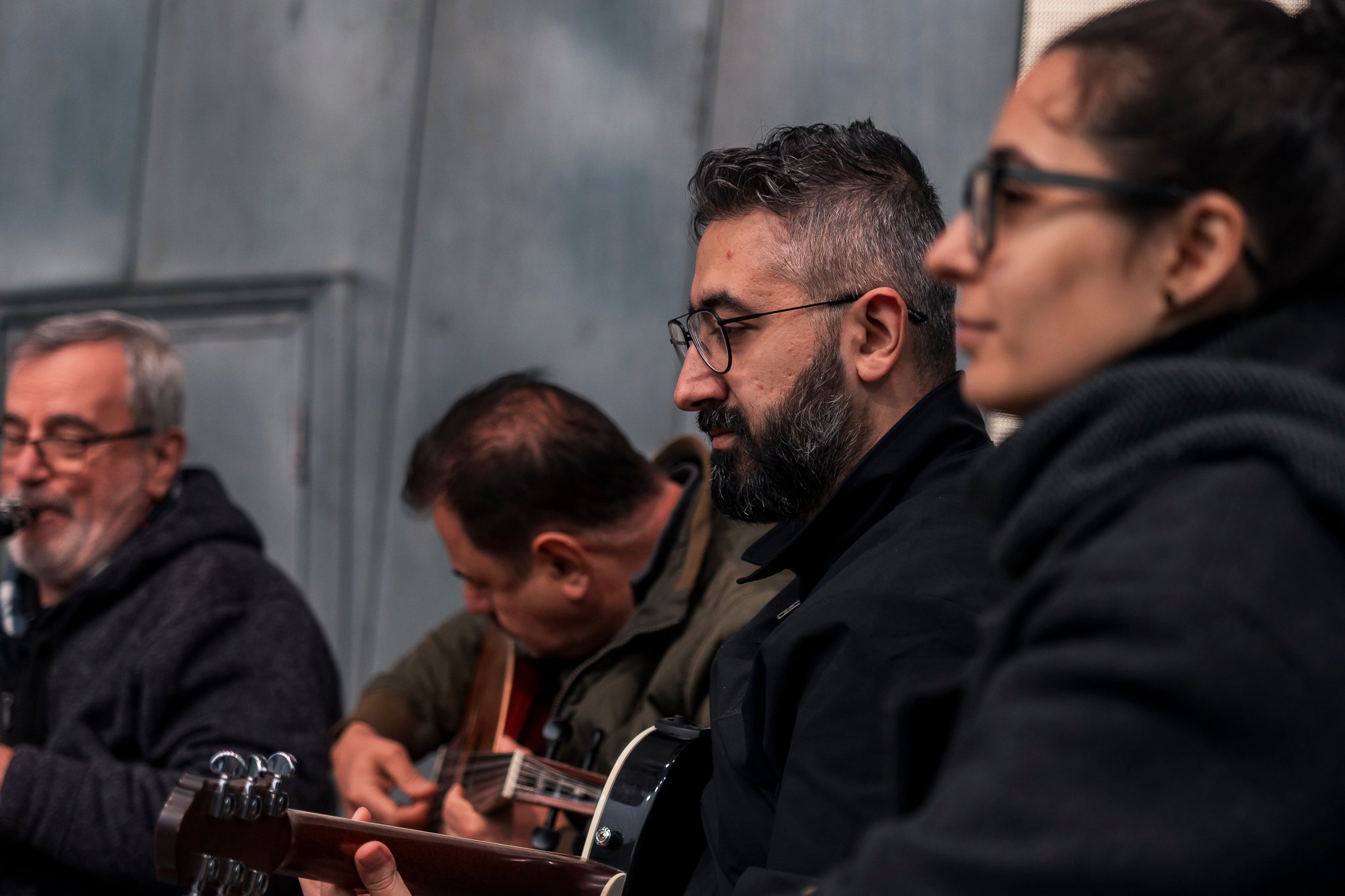 Arab classical music orchestra Tarab Ensemble performs on stage.