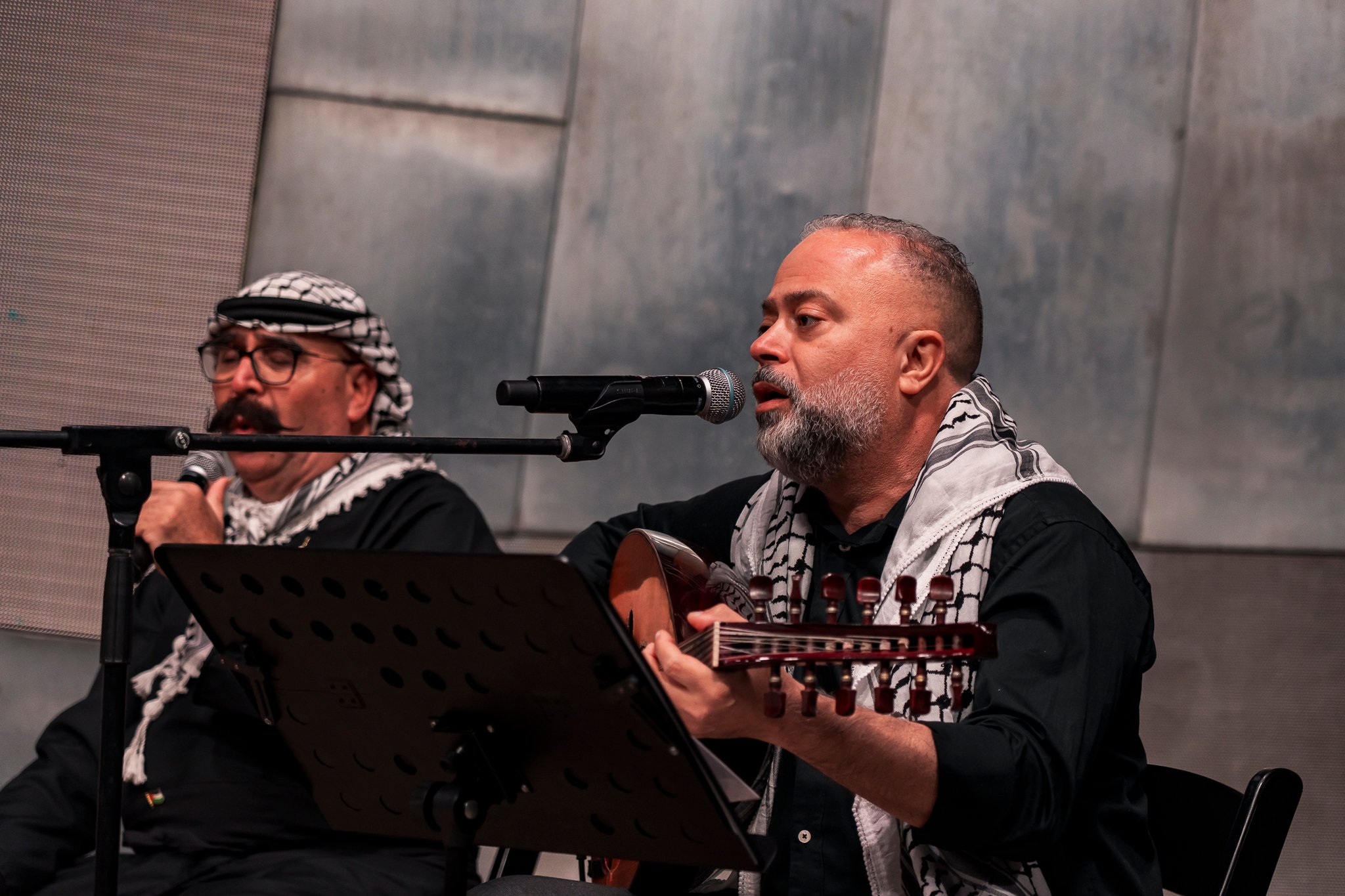 Sydney based theatre troupe Tales of a Homeland performs on stage.