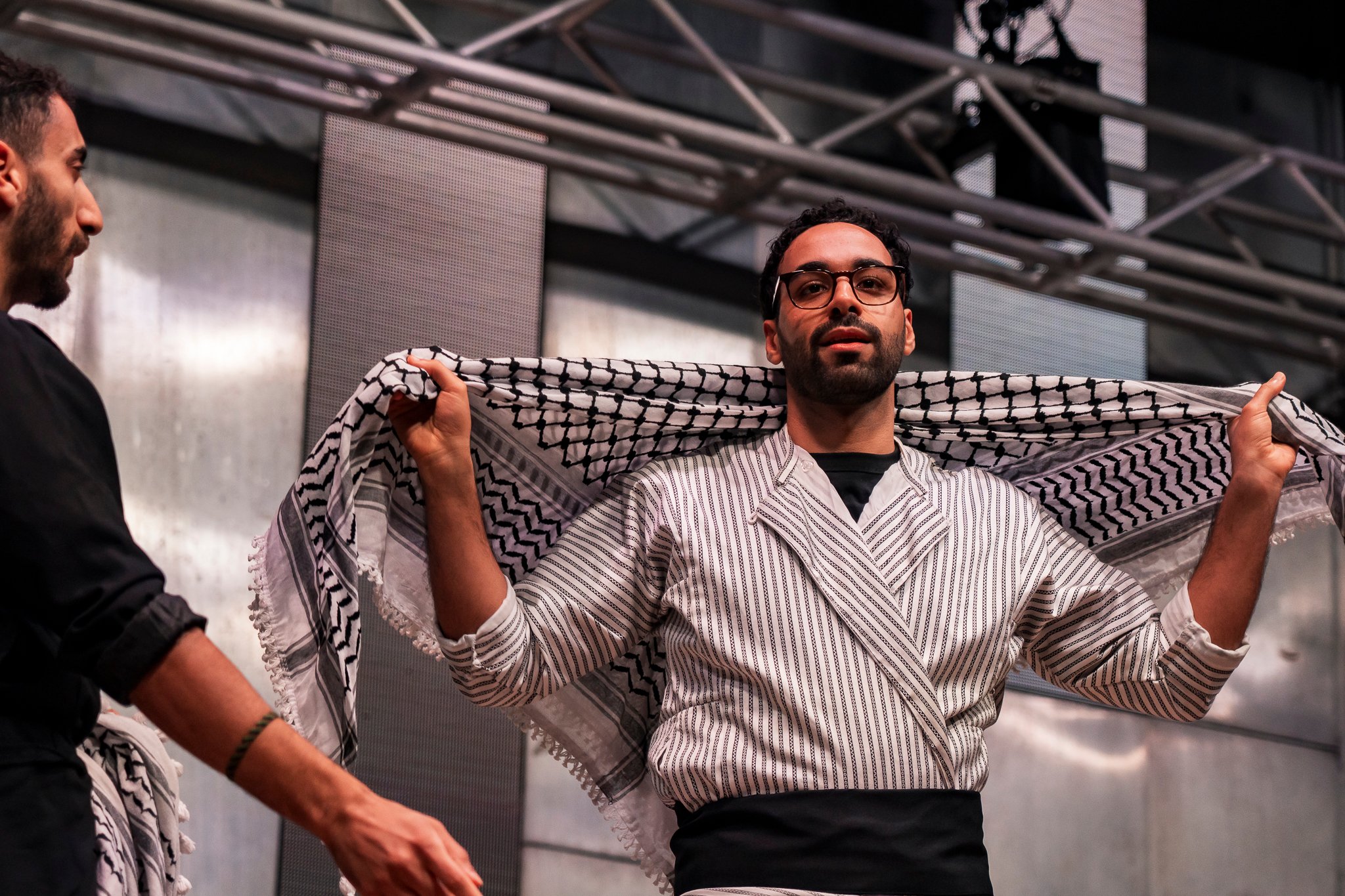 Sydney based theatre troupe Tales of a Homeland performs on stage.