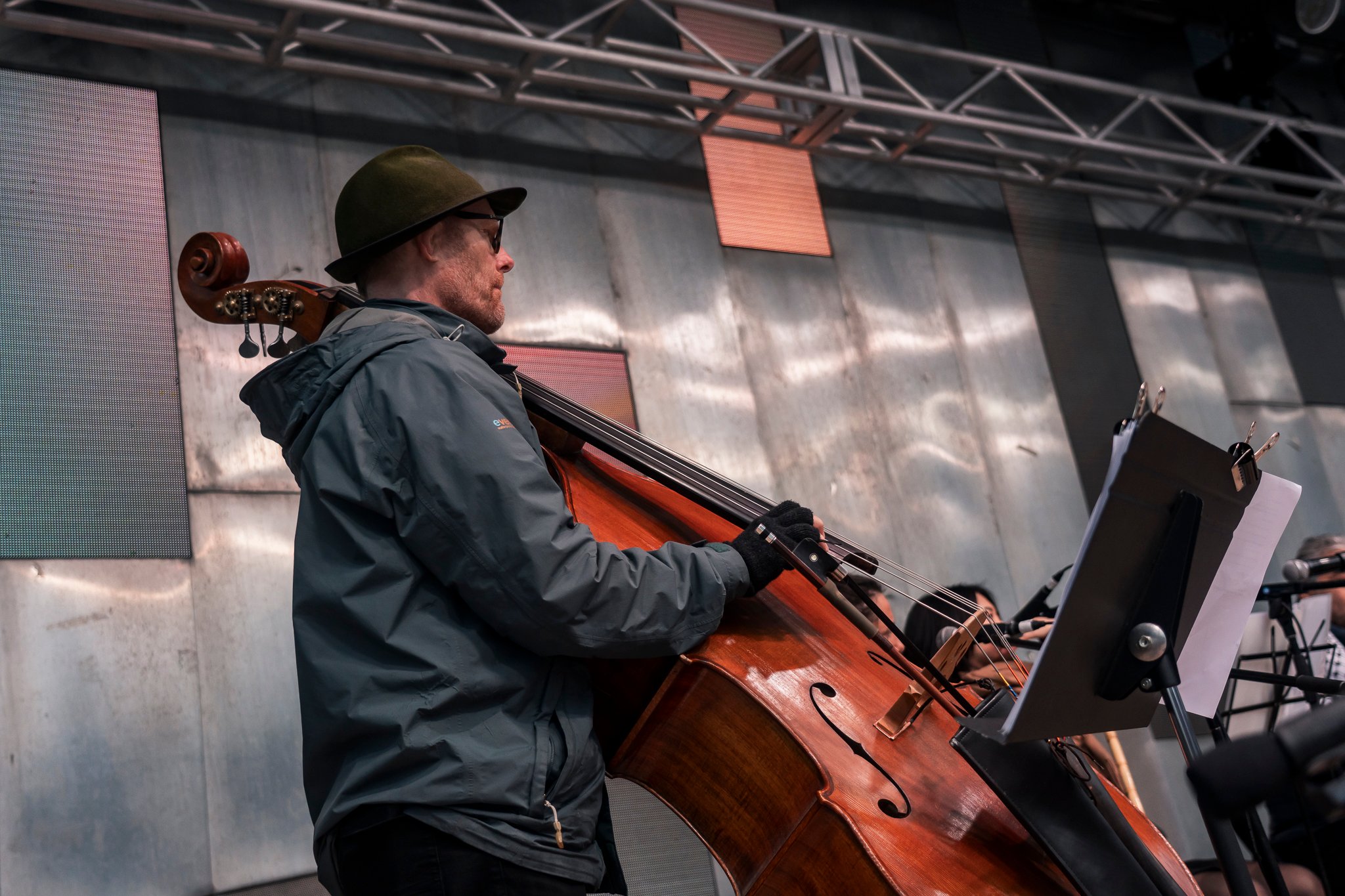 Arab classical music orchestra Tarab Ensemble performs on stage.