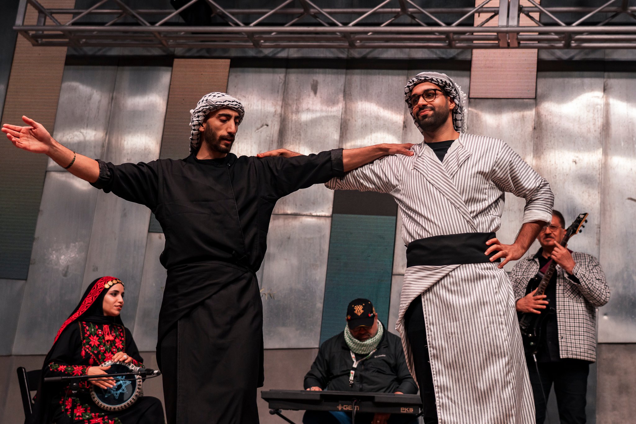 Sydney based theatre troupe Tales of a Homeland performs on stage.