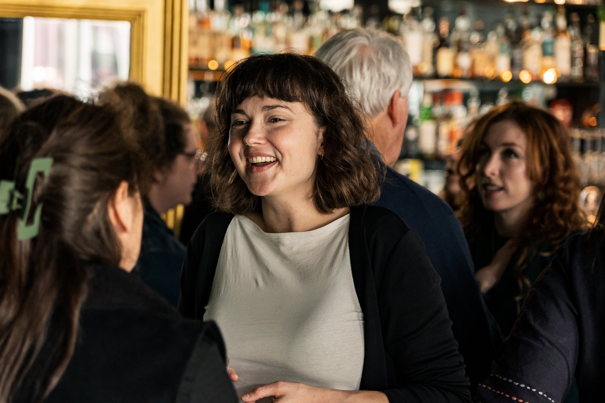 Greens Geelong candidate Emilie Flynn engaging with supporters at her campaign launch.