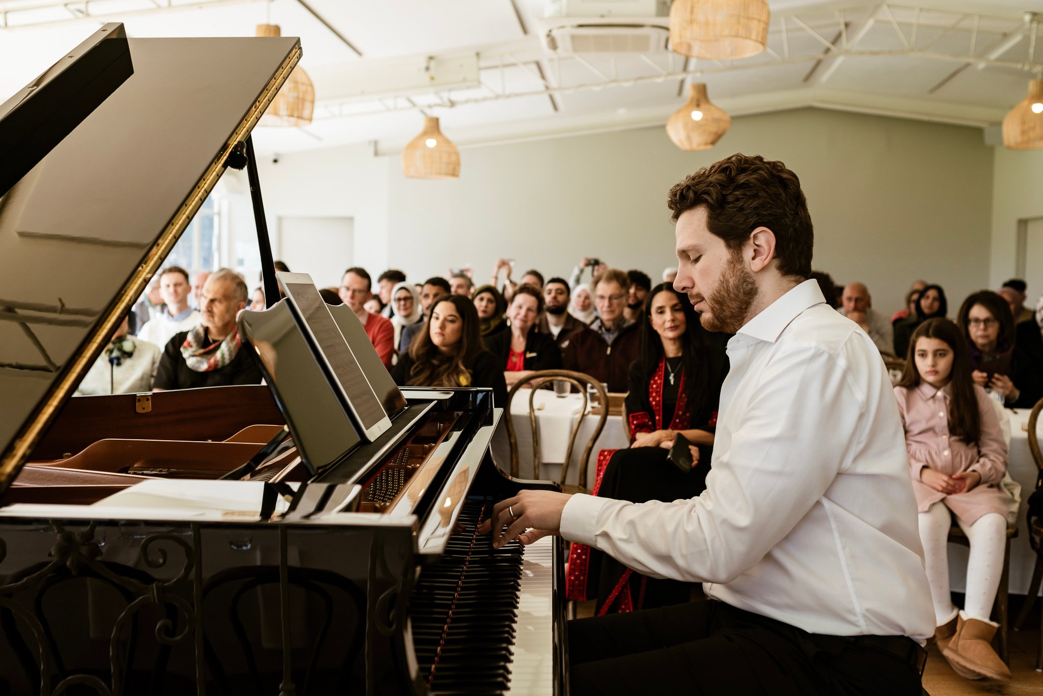 Jayson Gillham and Iyad Sughayer perform for Palestinian families