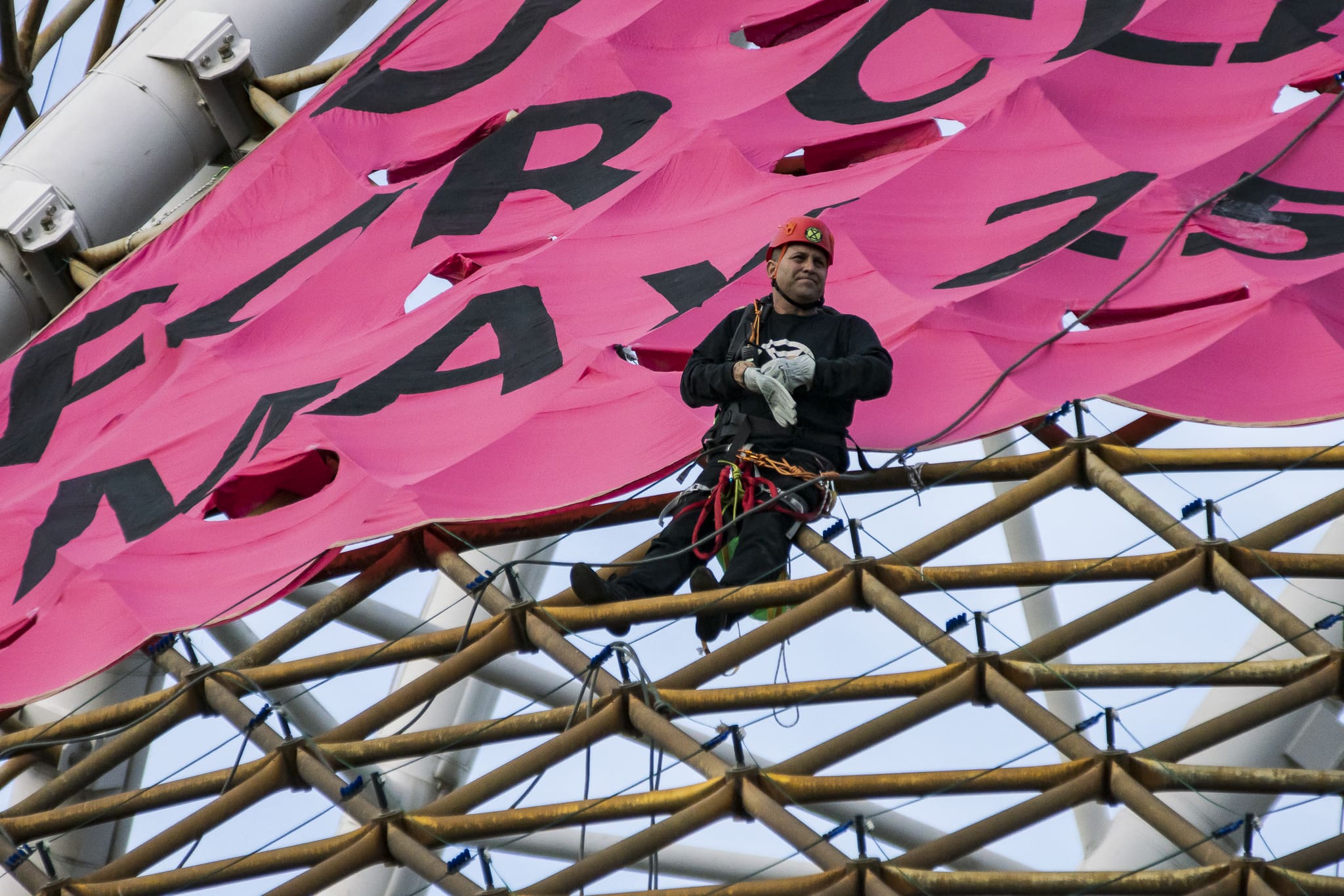 Brad Homewood on the Melbourne Arts Centre spire on Friday morning. Photo: Matt Hrkac