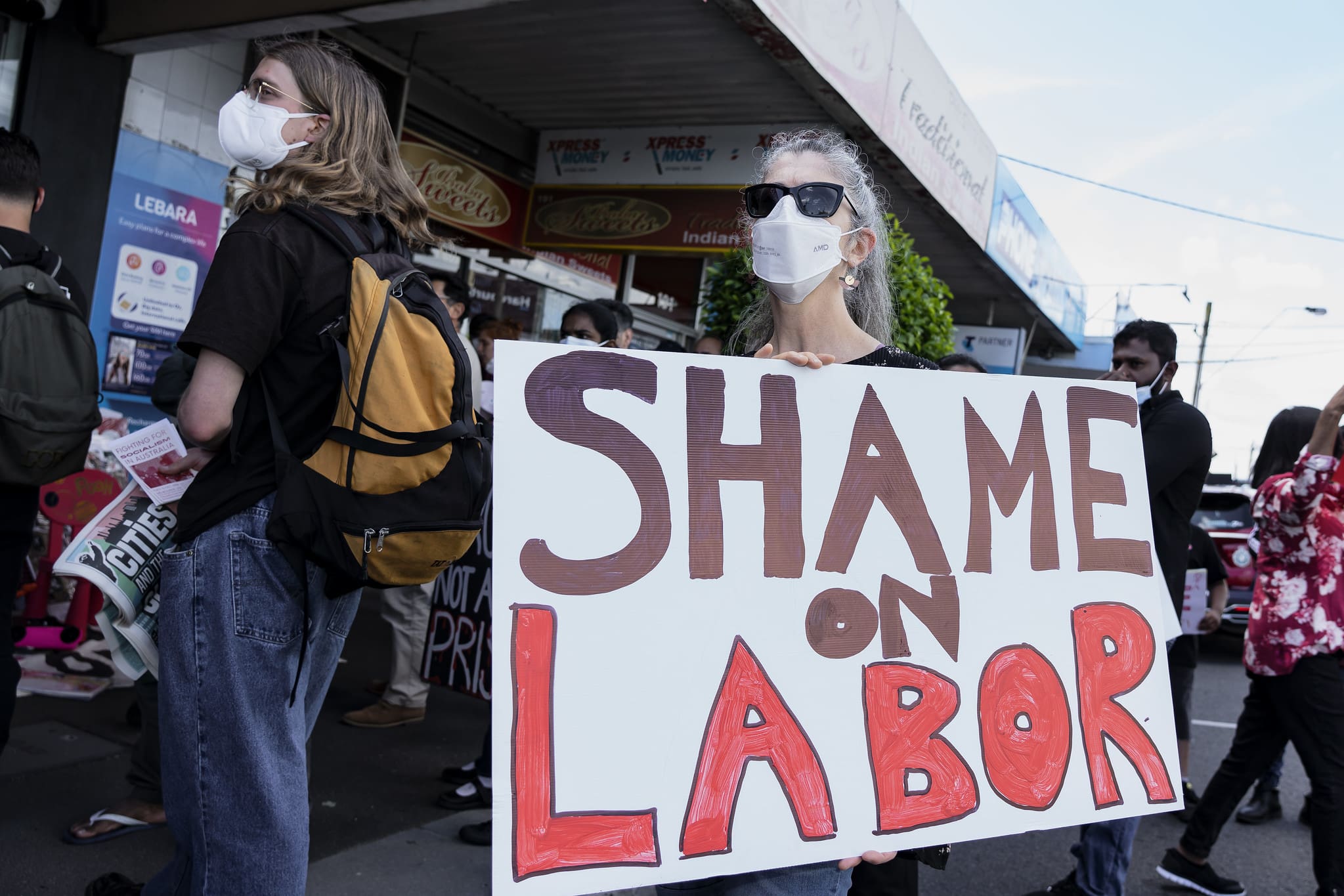 A protester demands the government get on with it, as Labor drags its feet on, among other issues, refugee rights. Photo: Matt Hrkac