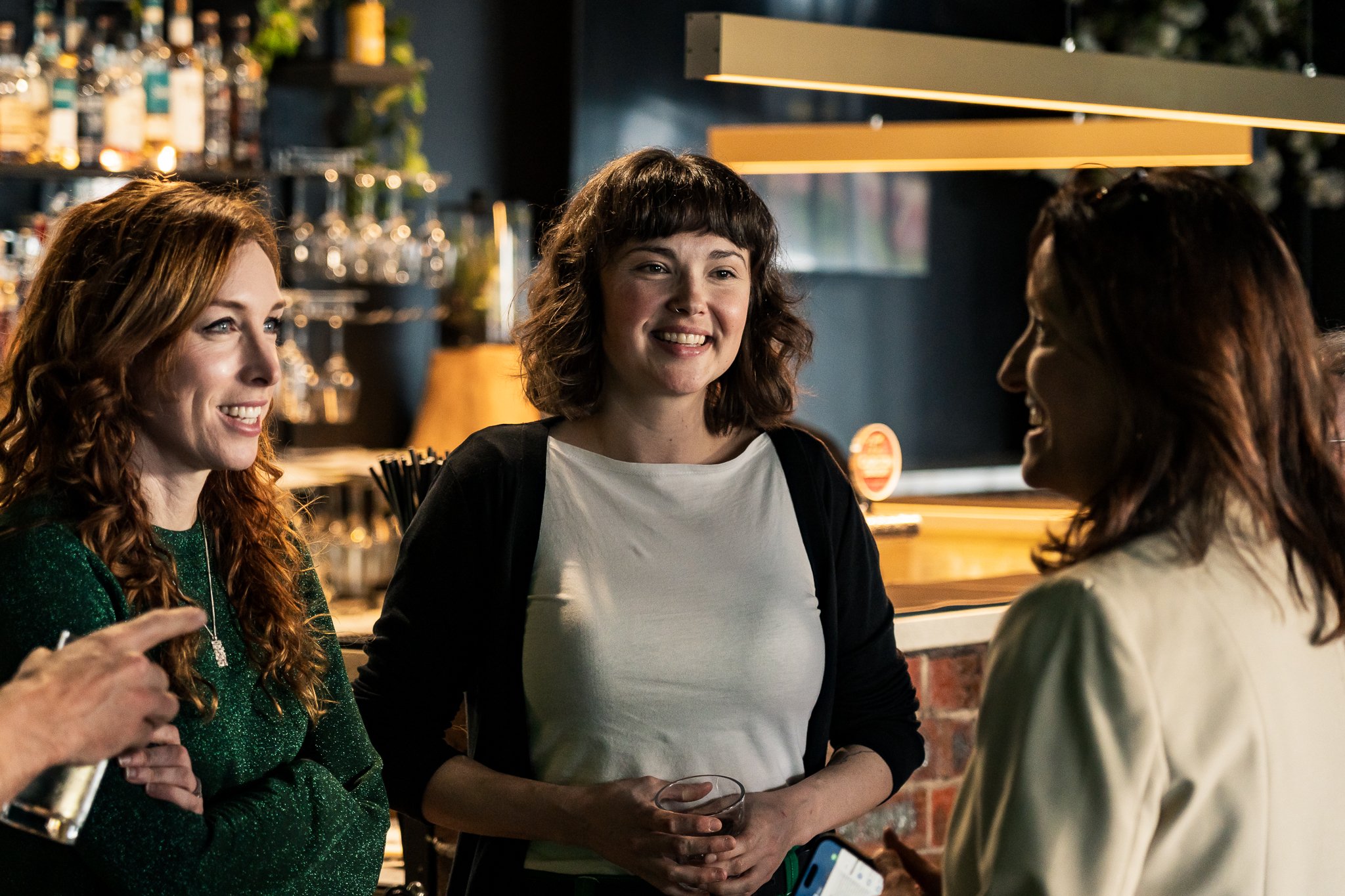Emilie Flynn, Greens candidate for Geelong, talking with Dr Sarah Mansfield and Senator Steph-Hodgins-May.