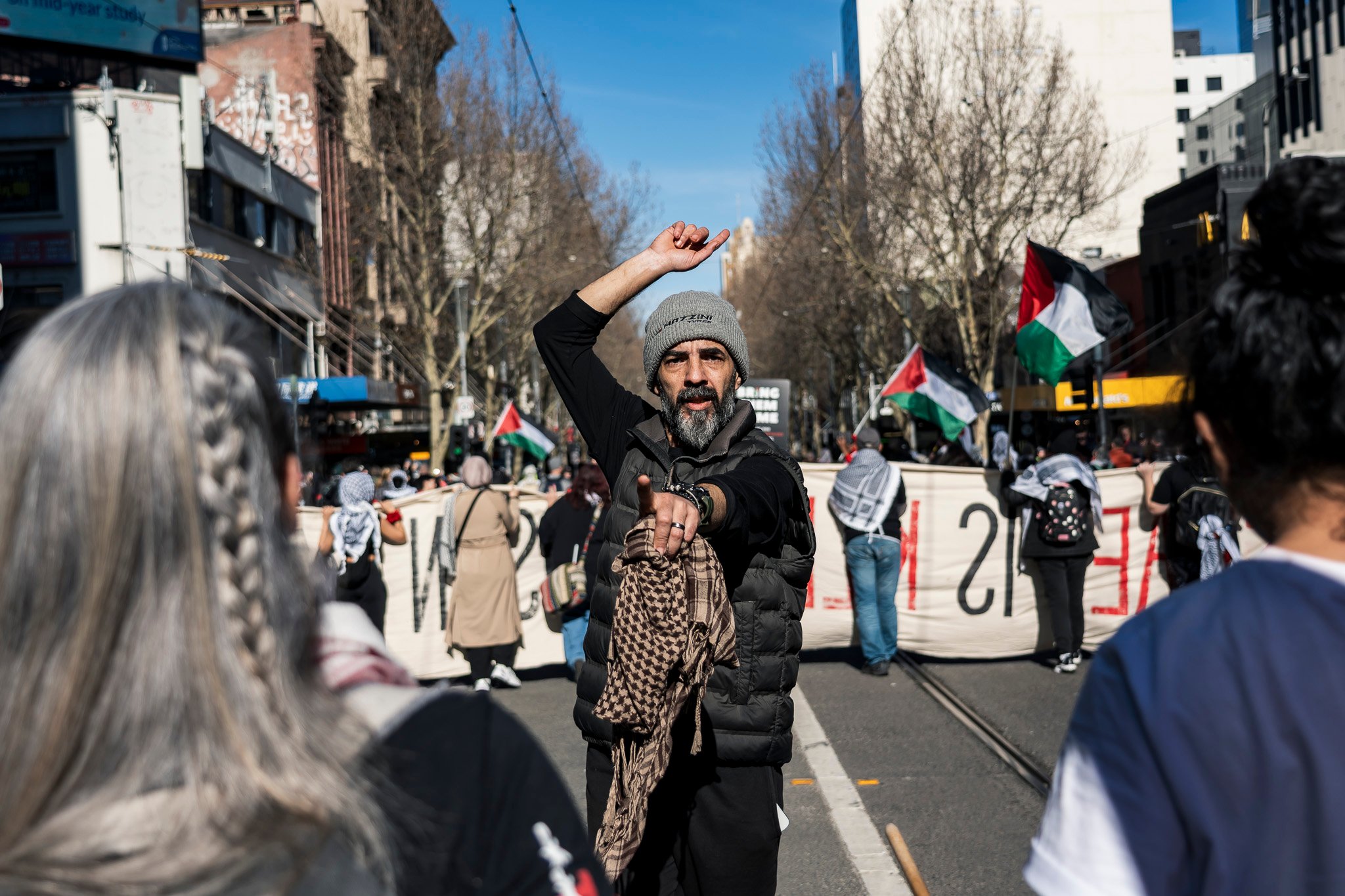 The march begins, moving down Swanston St.
