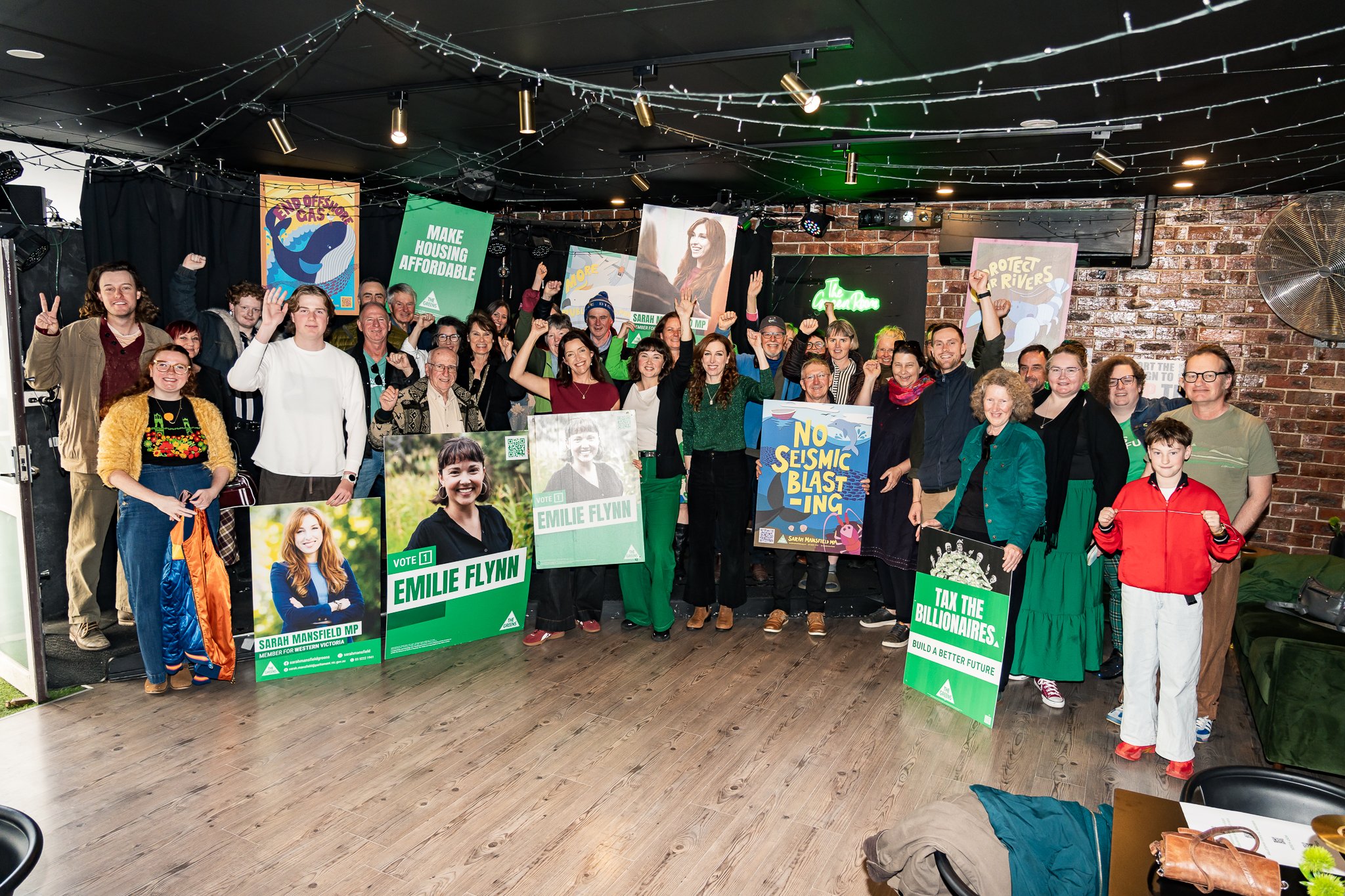 Greens supporters posing for a group photo.