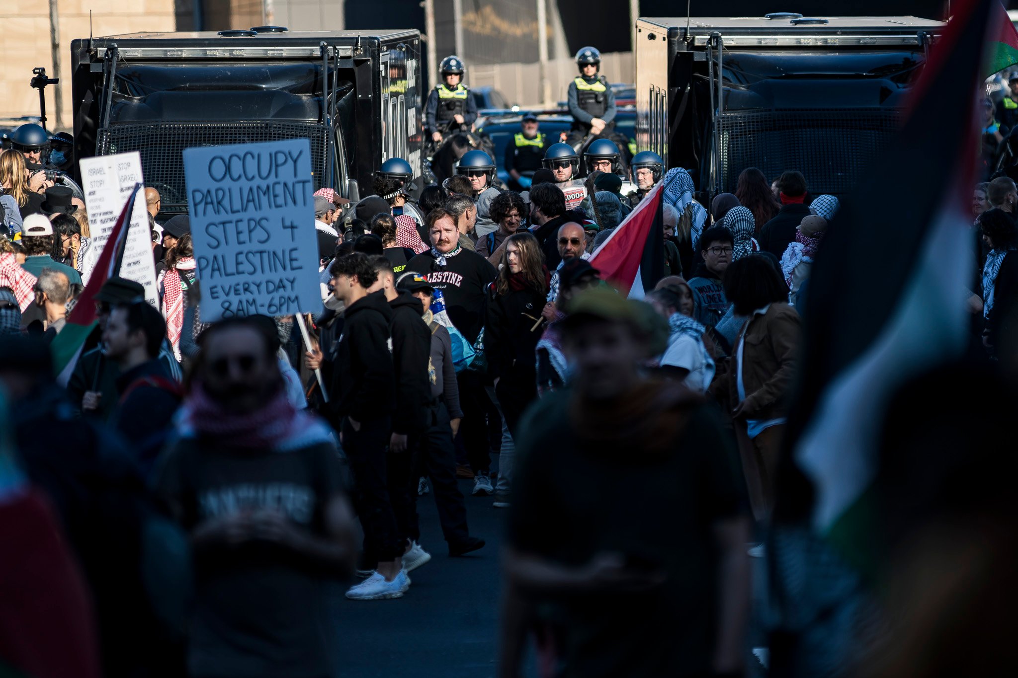 The march was met with dozens of Public Order Response Team (PORT) members in riot control gear.