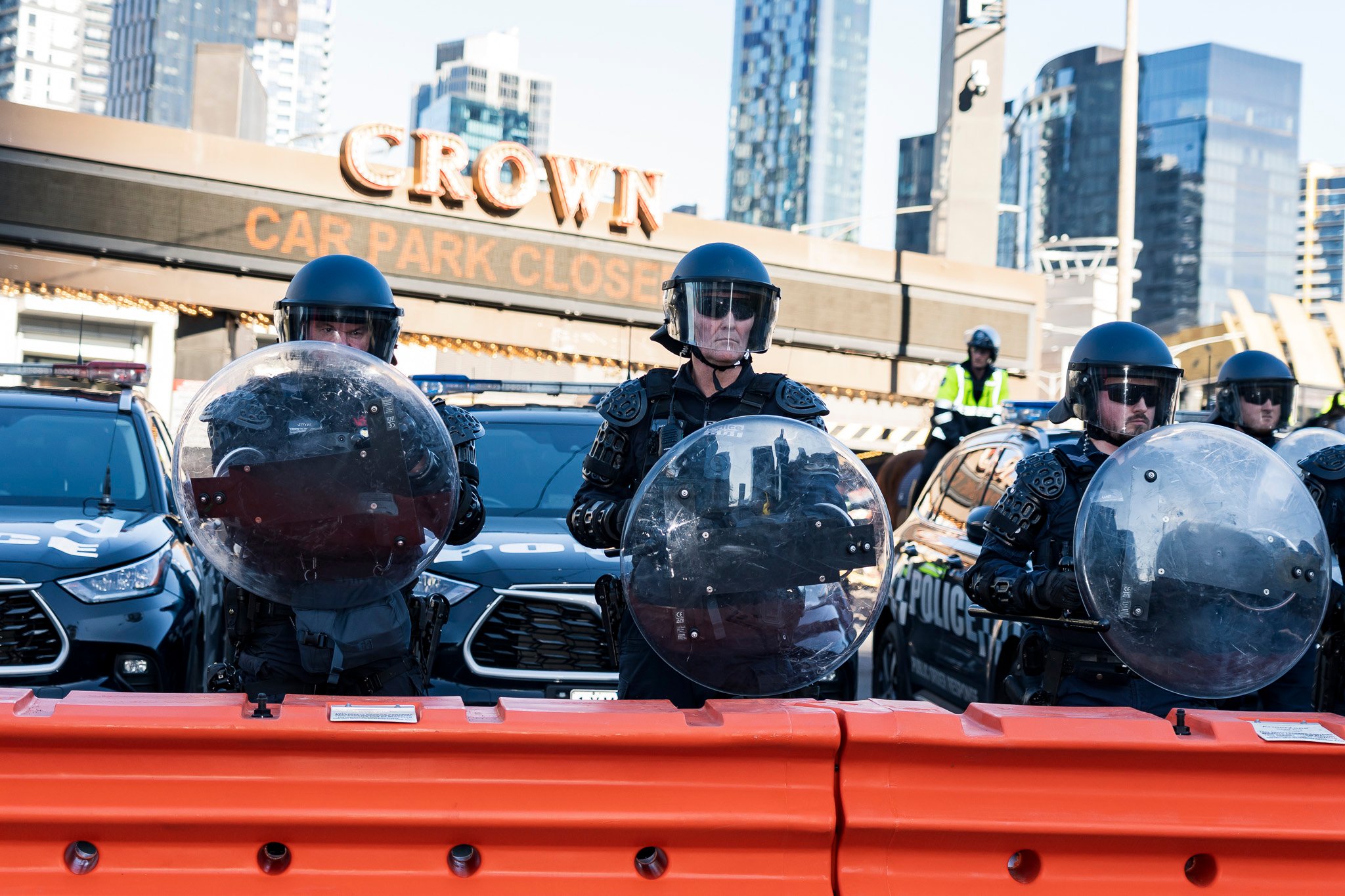 The march was met with dozens of Public Order Response Team (PORT) members in riot control gear.