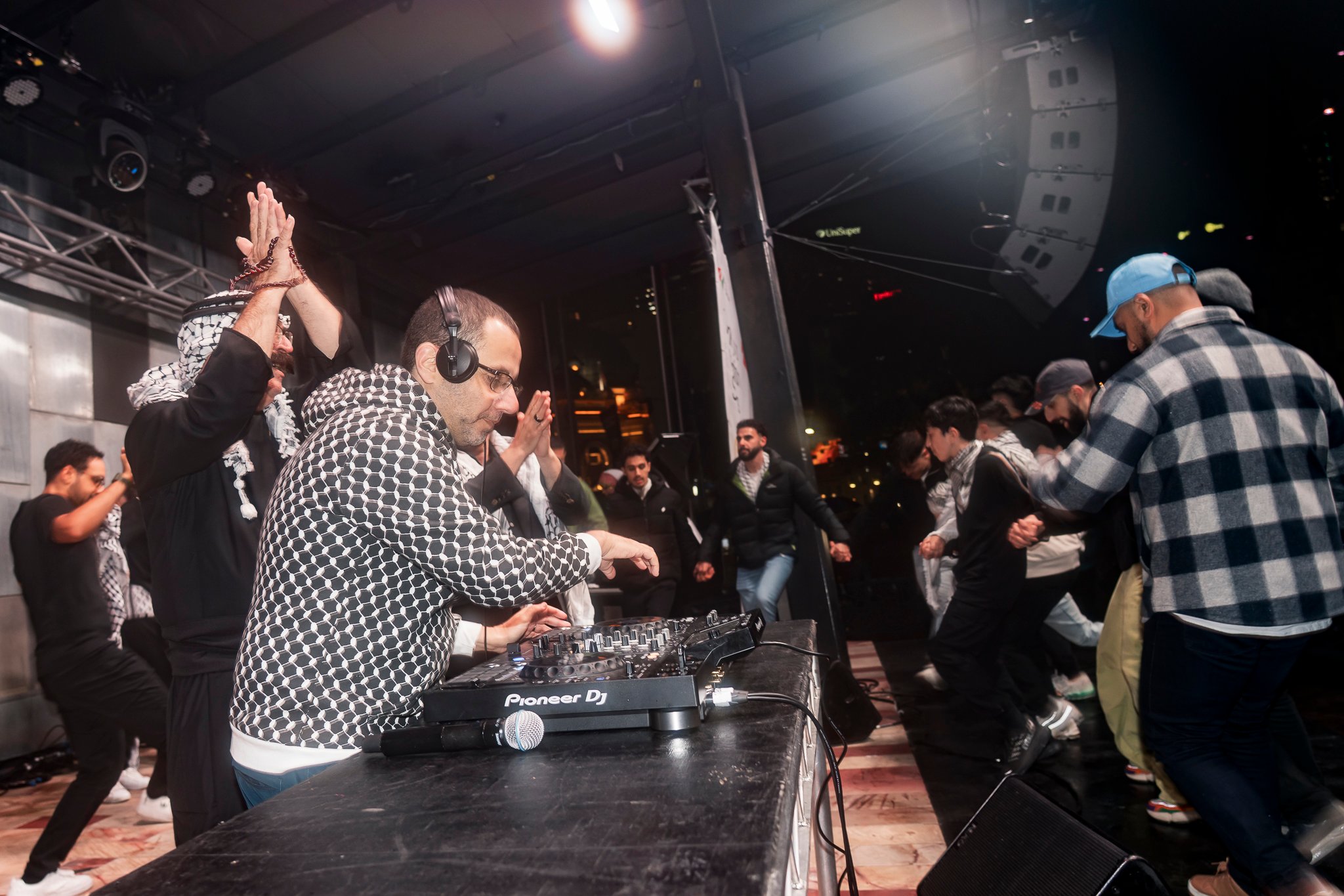 DJ Matab closes the event off as the crowd engages in dabke, both on the stage and in the audience.